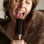 singing into hairbrush